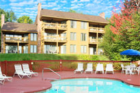 The outdoor pool on a sunny day at The Summit Resort